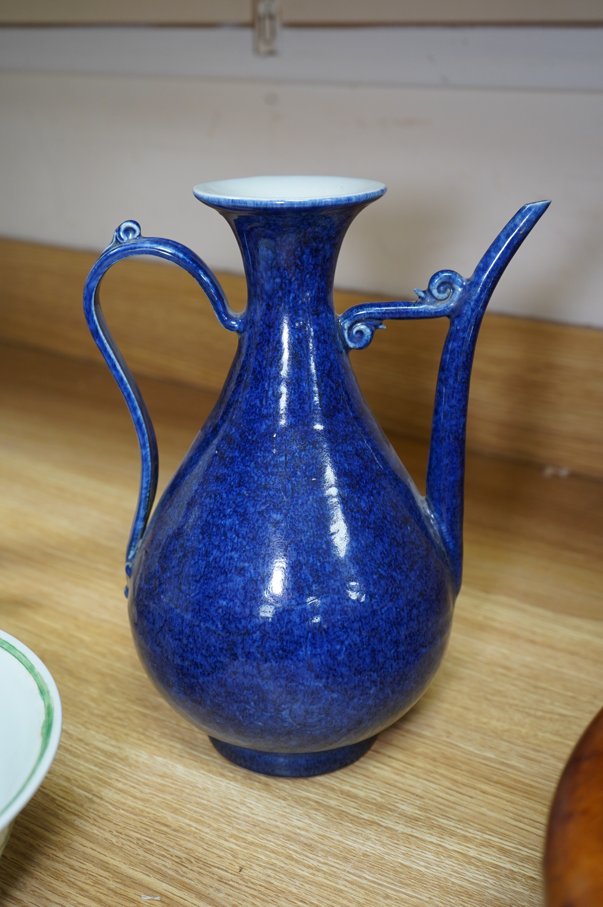 A Chinese porcelain powder blue ewer, 28cm high. Condition - good